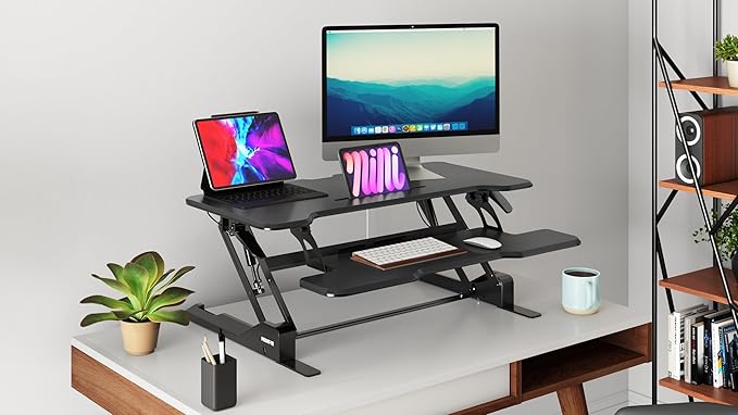 Mount-It! Height Adjustable Standing Desk Converter, 38” Wide, Stand Up Desk Riser for 2 Monitors, Manual Gas Spring Desktop Raises to 16.9", Fits Two Monitor Screens with Keyboard Mouse Tray in Black